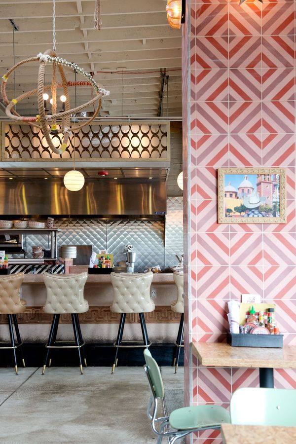 The coffeehouse counter and pink diamond wall